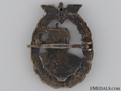 A Kriegsmarine Auxiliary Cruiser War Badge By French Maker Bacqueville, Paris