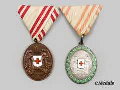 Austria, Empire. A Lot of Two Honor Decorations of the Red Cross (Silver Medal with War Decoration / Bronze Medal), c. 1918