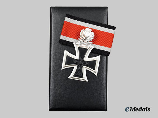 germany,_federal_republic._a_mint_cased_knight’s_cross_of_the_iron_cross_with_oak_leaves_and_swords,_by_s&_l,_c.1965__a_i1_3857