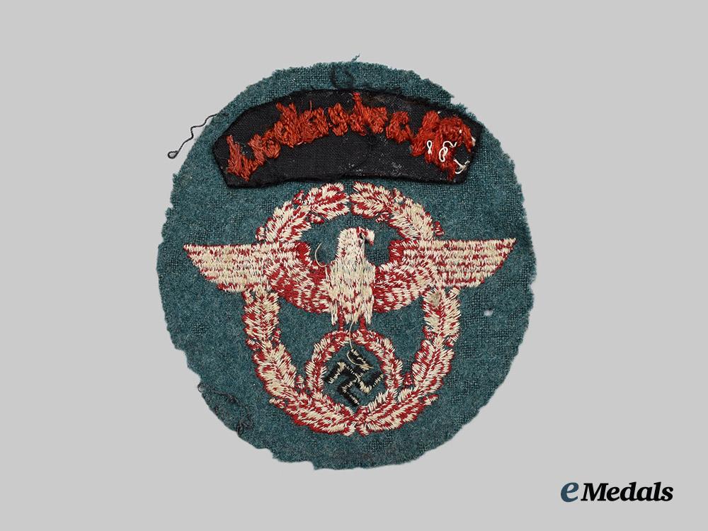 germany,_ordnungspolizei._a_fire_police_marienbad_district_sleeve_insignia,1936_pattern__a_i1_4185