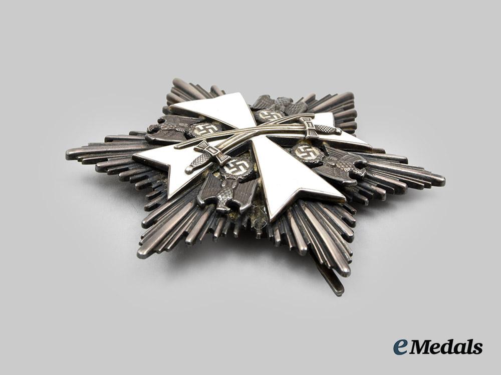 germany,_third_reich._an_order_of_the_german_eagle,_i_i_class_breast_star_with_swords,_by_gebrüder_godet__a_i1_4829