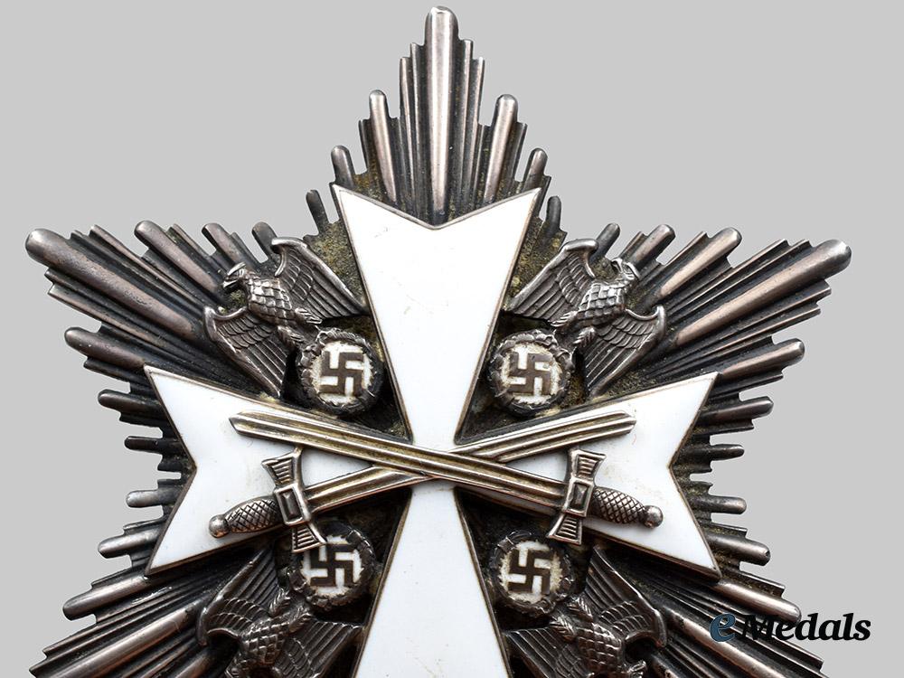 germany,_third_reich._an_order_of_the_german_eagle,_i_i_class_breast_star_with_swords,_by_gebrüder_godet__a_i1_4830