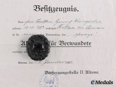 Germany, Imperial. A Wound Badge and Award Document to Heinrich Weingarten