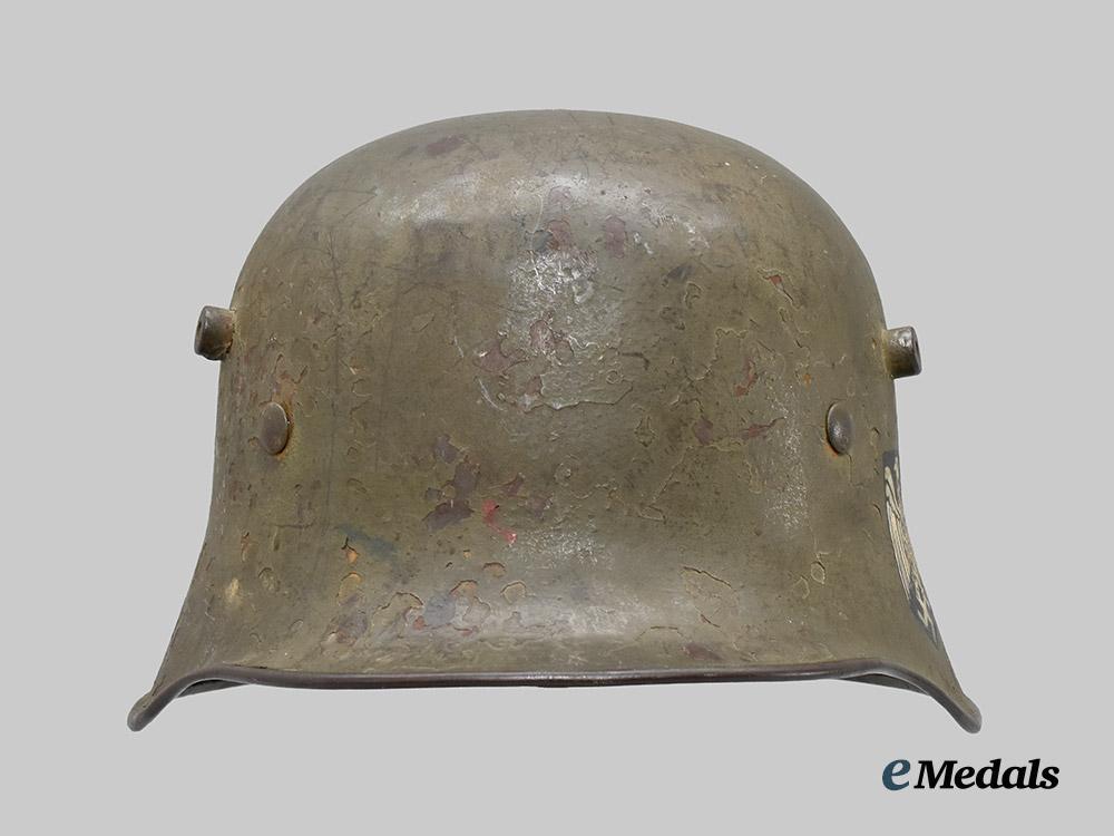 germany,_imperial._an_m18_stahlhelm,_refurbished_with_postwar_heer_decal___m_n_c0054