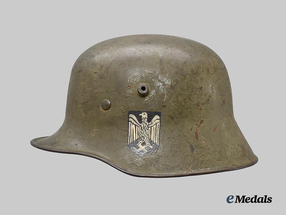 germany,_imperial._an_m18_stahlhelm,_refurbished_with_postwar_heer_decal___m_n_c0058