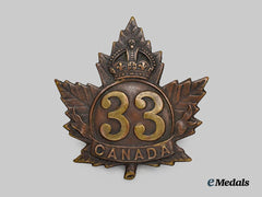 Canada, CEF. A  33rd Infantry Battalion Cap Badge, Type II with "33" within a circle