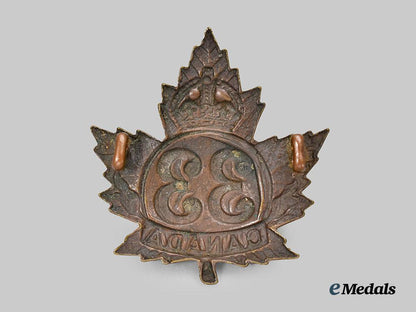 canada,_c_e_f._a33rd_infantry_battalion_cap_badge,_type_i_i_with"33"_within_a_circle___m_n_c0081