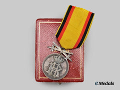 Reuss, Principality. A Princely Honour Cross, Silver Merit Medal with Swords and Case, by Bury & Leonhard