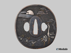 Japan, Empire. A Konotori Oriental Stork Tsuba (Hand Guard)