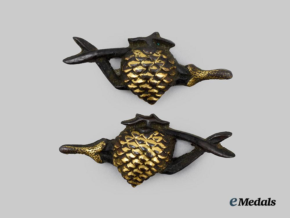 japan,_empire._a_matching_set_of_kikubotan_menuki(_ornamental_edged_weapon_fittings)___m_n_c1092