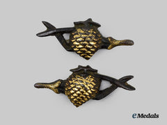 Japan, Empire. A Matching Set of Kikubotan Menuki (Ornamental Edged Weapon Fittings)