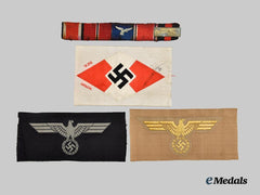 Germany, Third Reich. A Luftwaffe Long Service Medal Ribbon Bar with Three Unissued Insignia