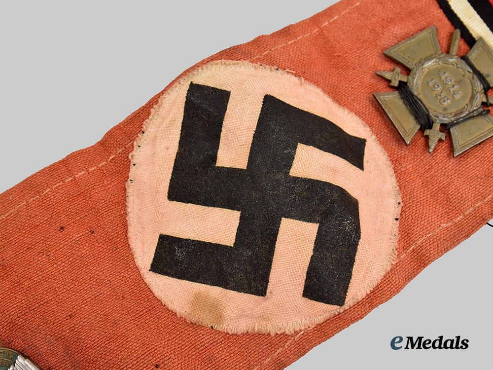 germany,_third_reich._an_n_s_d_a_p_armband,_with_awards_and_insignia,_allied_souvenir_assembly___m_n_c1786