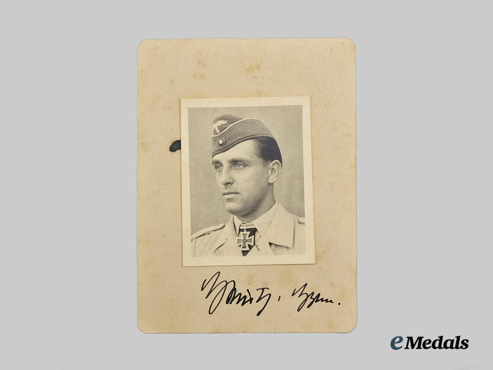 germany,_luftwaffe._a_lot_of_private_photos_of_luftwaffe_bomber_ace_kurt_heintz,_knight’s_cross_of_the_iron_cross,_with_signature___m_n_c1810