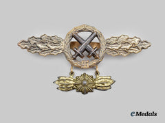 Germany, Luftwaffe. A Rare Air-to-Ground Support Clasp, with Star Pendant, by C.E. Juncker