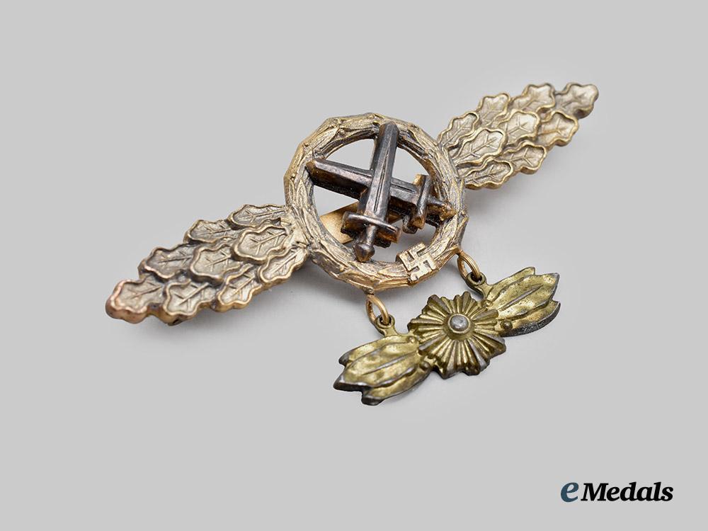 germany,_luftwaffe._a_rare_air-to-_ground_support_clasp,_with_star_pendant,_by_c._e._juncker___m_n_c2247