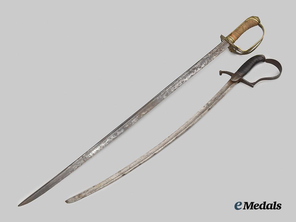 international._a_pair_of19th_century_european_swords___m_n_c2341