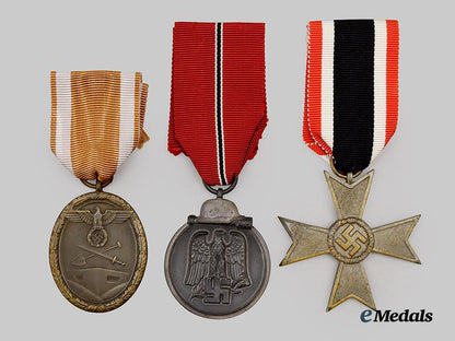 germany,_werhmacht._a_mixed_lot_of_combat_and_service_medals,_with_original_packaging___m_n_c2808