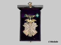 Japan, Empire. A Cased Order of the Golden Kite, VII. Class Breast Badge, with Matching Boutonniere