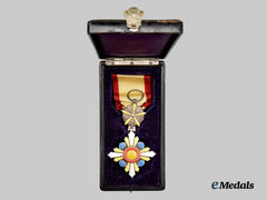 Japan, Manchukuo Empire. A Cased Order of the Auspicious Clouds, VI. Class Breast Badge