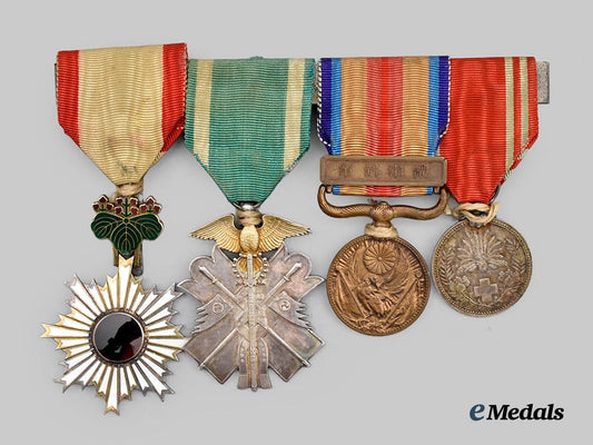 japan,_empire._a_medal_bar_to_a_decorated_second_war_veteran(_rising_sun/_golden_kite/_china_war_medal/_red_cross)___m_n_c3166