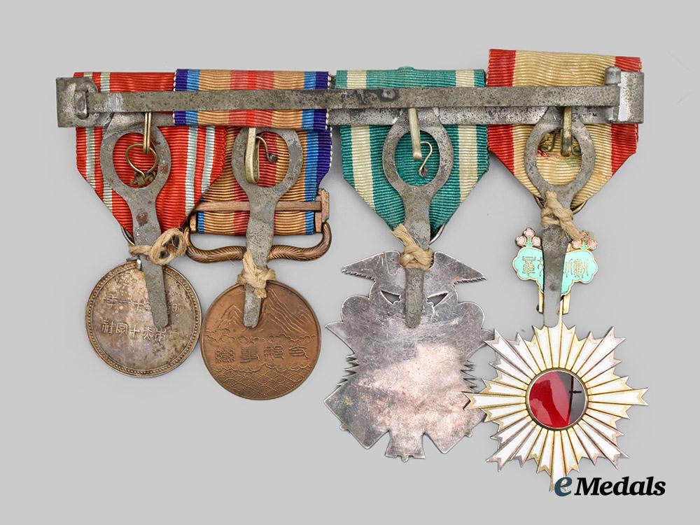 japan,_empire._a_medal_bar_to_a_decorated_second_war_veteran(_rising_sun/_golden_kite/_china_war_medal/_red_cross)___m_n_c3167