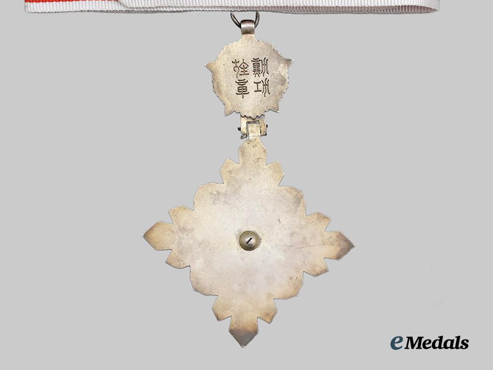 japan,_manchukuo_empire._an_order_of_the_auspicious_clouds,_i_i._class_commander_badge___m_n_c3189