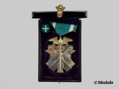 Japan, Empire. A Cased Order of the Golden Kite, VII. Class Breast Badge, with Matching Boutonniere