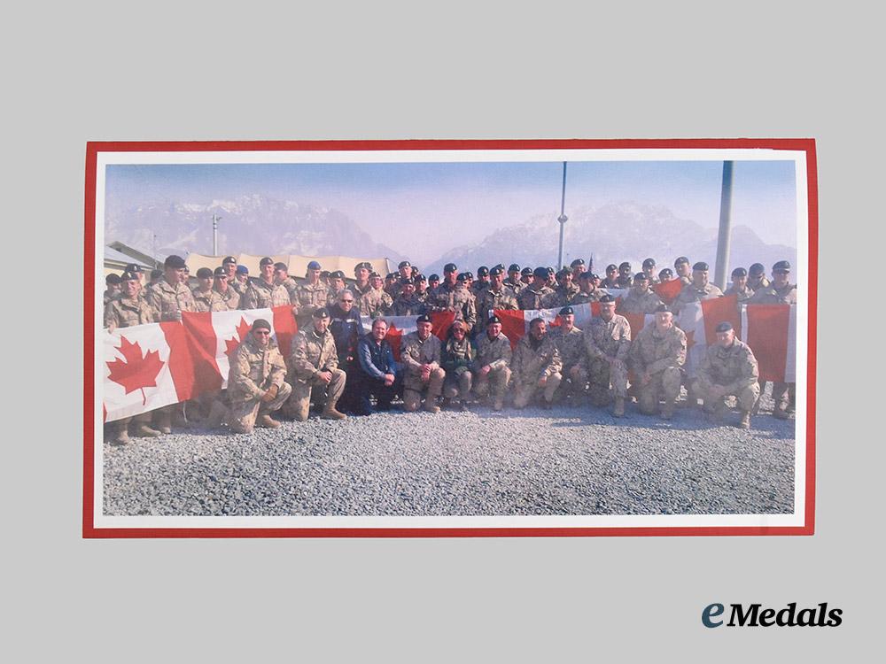 canada,_commonwealth._a_canadian_flag_signed_by_captain_wayne_johnston,_founder_of_the_wounded_warriors_fund,_along_with_the_signatures_of_other_members_of_the_canadian_forces___m_n_c3724