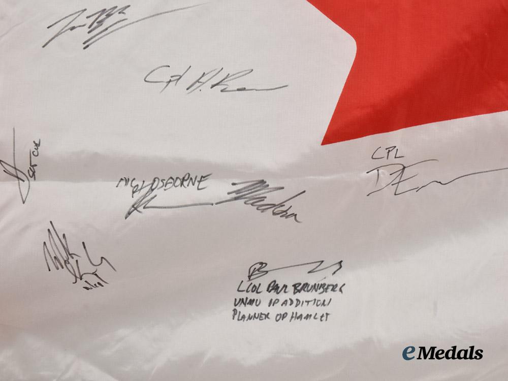 canada,_commonwealth._a_canadian_flag_signed_by_captain_wayne_johnston,_founder_of_the_wounded_warriors_fund,_along_with_the_signatures_of_other_members_of_the_canadian_forces___m_n_c3728