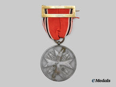 Germany, Third Reich. An Order of the German Eagle, Merit Medal in Bronze to Spanish Recipient