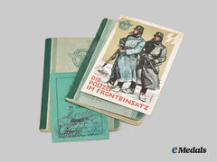 Germany, Ordnungspolizei. A Pair of Service Passes to Decorated Officers, with Feldpost Postcard