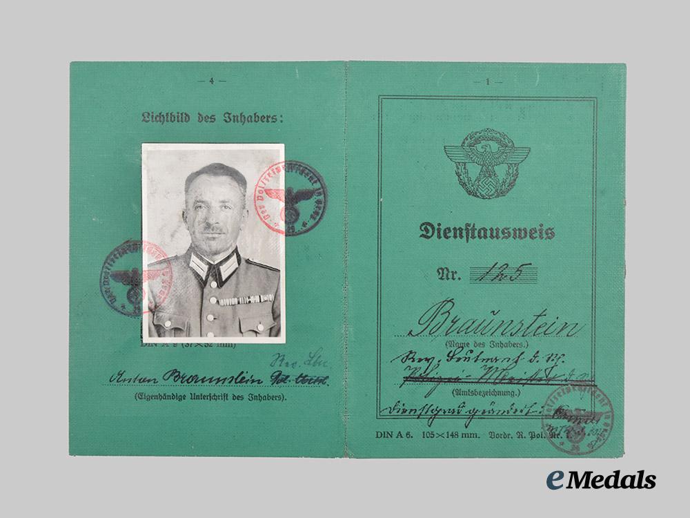 germany,_ordnungspolizei._a_lot_of_service_passes_to_decorated_officers,_with_postcard___m_n_c4803