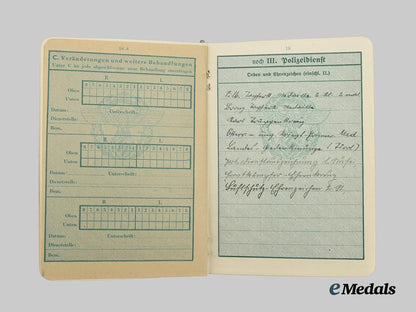 germany,_ordnungspolizei._a_lot_of_service_passes_to_decorated_officers,_with_postcard___m_n_c4809