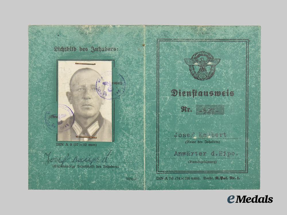 germany,_ordnungspolizei._a_lot_of_service_passes_to_decorated_officers,_with_postcard___m_n_c4813