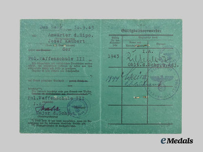 germany,_ordnungspolizei._a_lot_of_service_passes_to_decorated_officers,_with_postcard___m_n_c4814