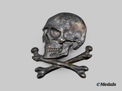 Spain, Spanish State. A Black Brigade Skull Cap Badge, c.1937