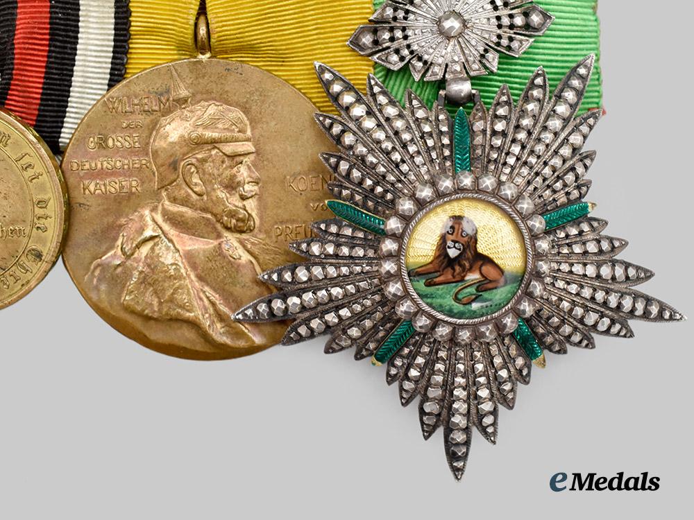 prussia,_kingdom._a_unique_franco-_prussian_war_red_eagle_medal_bar_with_an_order_of_the_lion_and_sun___m_n_c4888