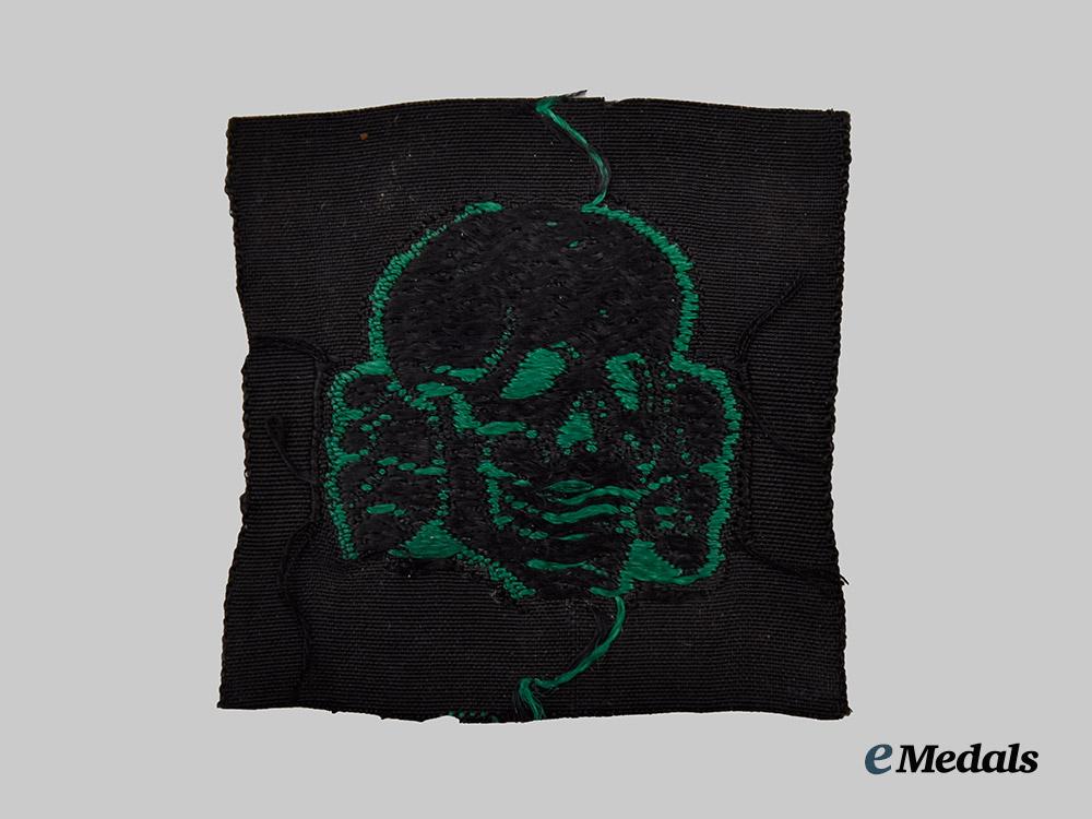 germany,_s_s._a_rare_and_mint_set_of_waffen-_s_s_camouflage_field_cap_insignia___m_n_c4894