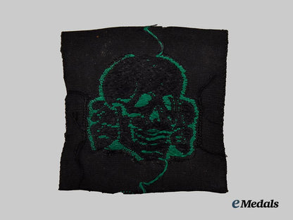 germany,_s_s._a_rare_and_mint_set_of_waffen-_s_s_camouflage_field_cap_insignia___m_n_c4894