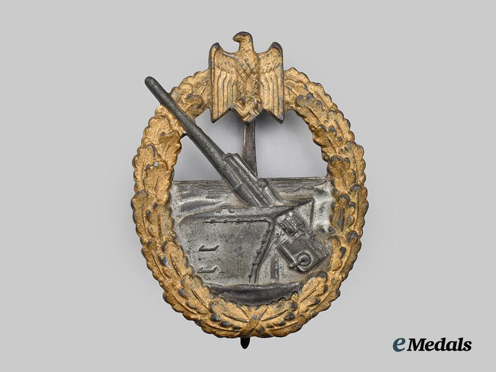 germany,_kriegsmarine._a_coastal_artillery_war_badge,_by_c._e._juncker___m_n_c5140