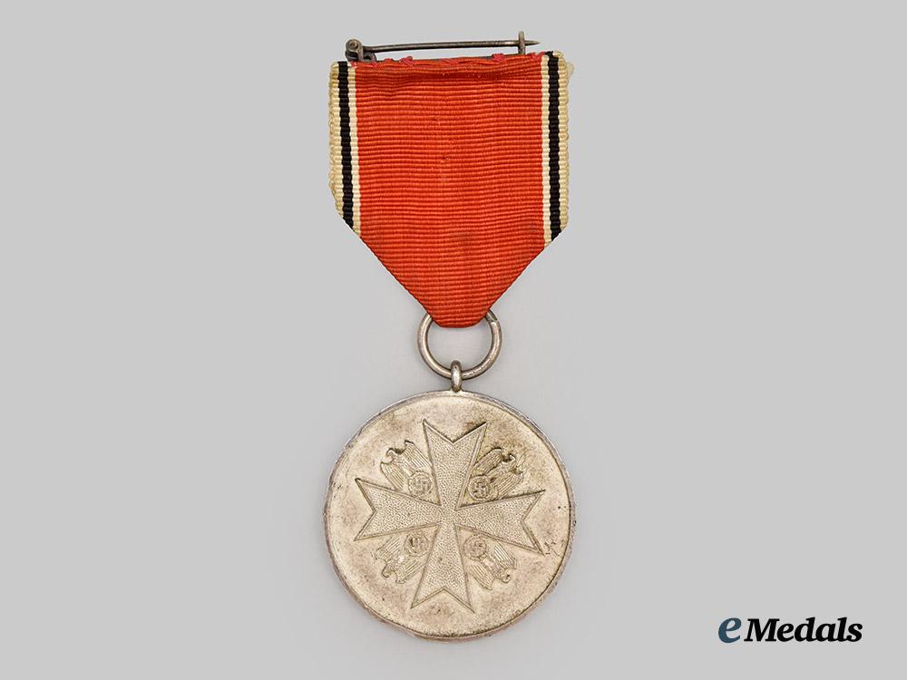 germany,_third_reich._a_rare_and_early_order_of_the_german_eagle,_silver_medal_of_merit_with_case,_c.1937___m_n_c5607