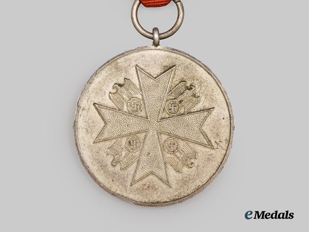 germany,_third_reich._a_rare_and_early_order_of_the_german_eagle,_silver_medal_of_merit_with_case,_c.1937___m_n_c5608