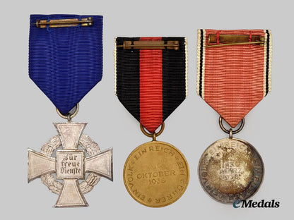 germany,_third_reich._a_mixed_lot_of_cased_awards_for_civil_and_occupation_service___m_n_c5620