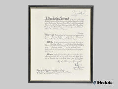 United Kingdom. A Framed OBE Award Document Signed by Queen Elizabeth & Prince Philip