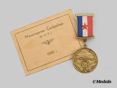 Yugoslavia, Republic. A Rare Medal for the Construction of the Pancevac Bridge over the Danube, with Award Certificate to Ivan Vasilievich, c. 1946