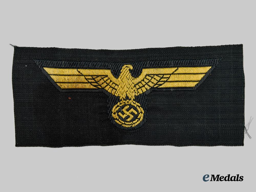 germany,_kriegsmarine._a_coastal_artillery_war_badge,_with_cap_insignia___m_n_c7226