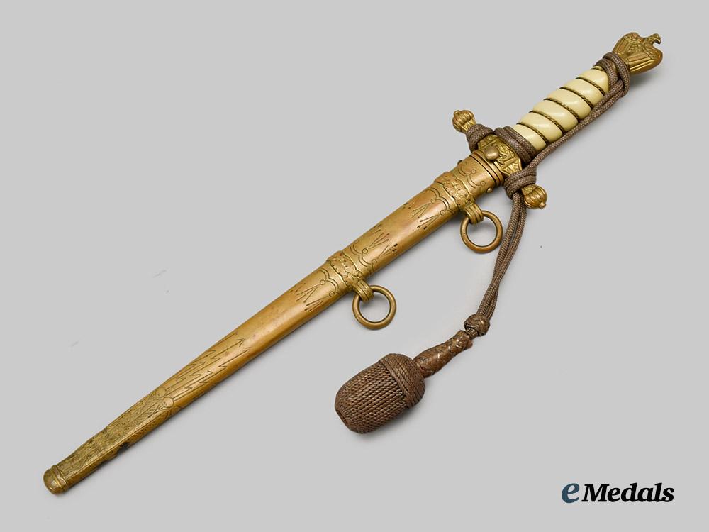 germany,_kriegsmarine._an_officer’s_dress_dagger,_second_pattern_with_hanger,_owner-_attributed_by_carl_eickhorn___m_n_c7938