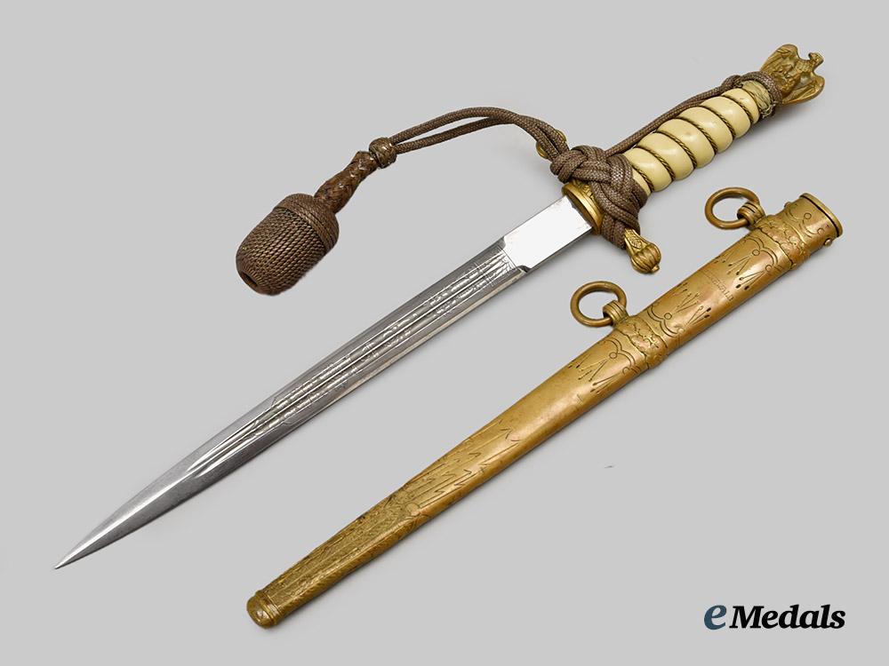 germany,_kriegsmarine._an_officer’s_dress_dagger,_second_pattern_with_hanger,_owner-_attributed_by_carl_eickhorn___m_n_c7940