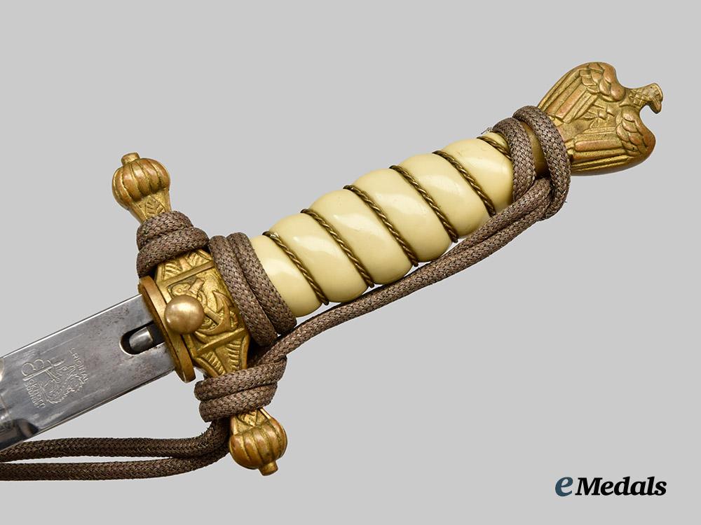 germany,_kriegsmarine._an_officer’s_dress_dagger,_second_pattern_with_hanger,_owner-_attributed_by_carl_eickhorn___m_n_c7942